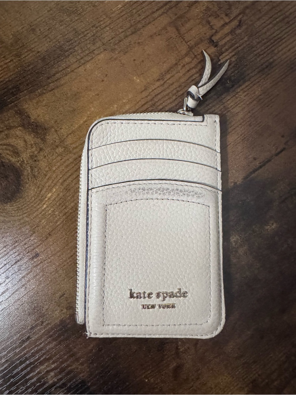 kate spade Cream Pebbled Leather Zip Card Case with Gold Logo
